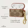 Coach รุ่น Slim Wrap - เคส AirPods Pro 1/2 - สี Signature Tan